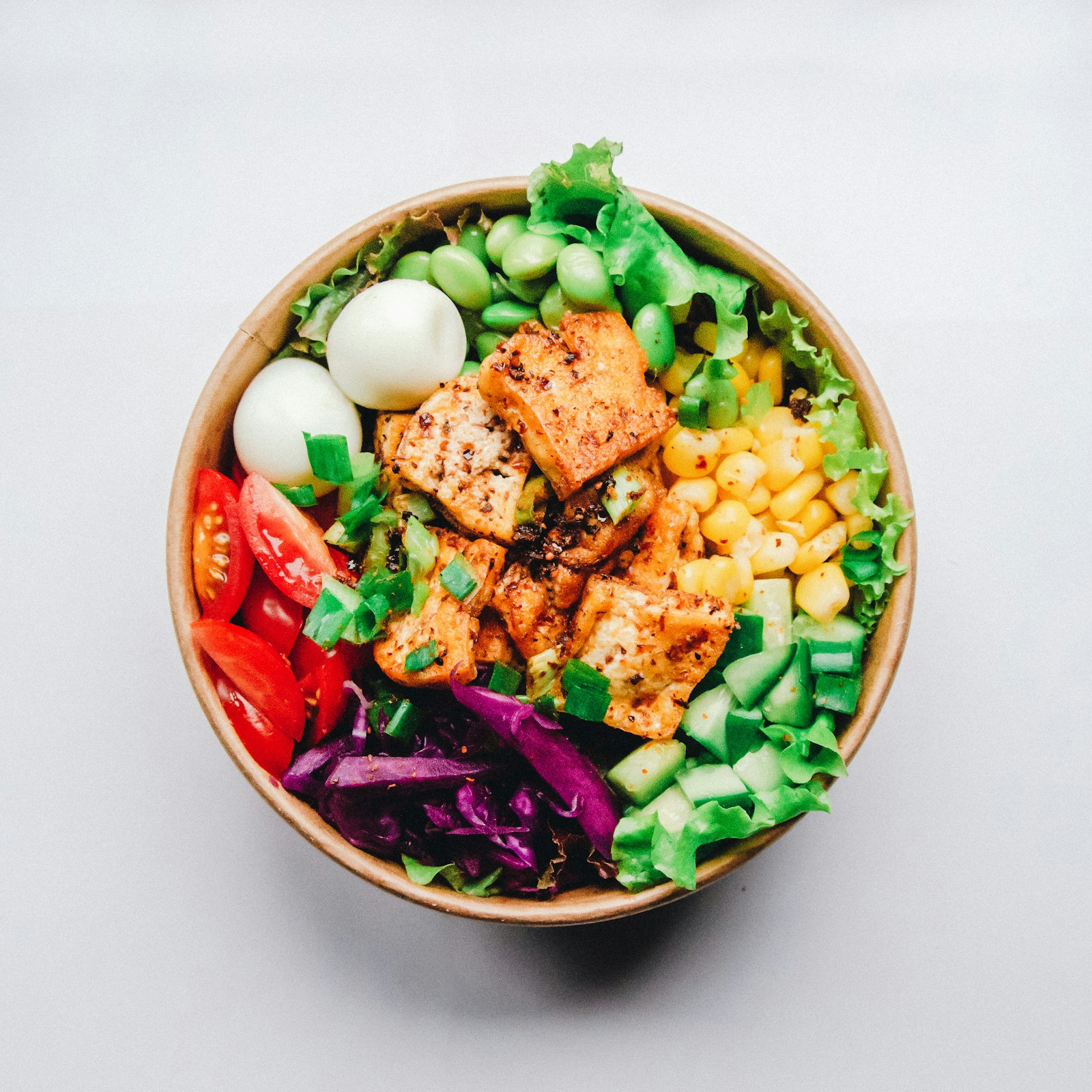 Meal prep containers with vegetables and balanced nutrition